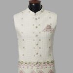 Ivory Embroidered Waistcoat with White Suit – Festive & Wedding Wear for Men